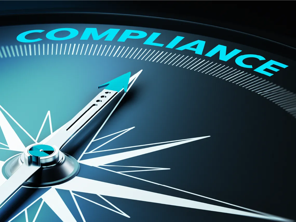 Compass pointing to compliance adherence