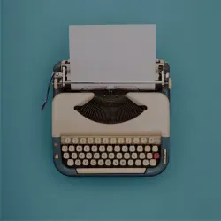 Typewriter with paper for writing a blog